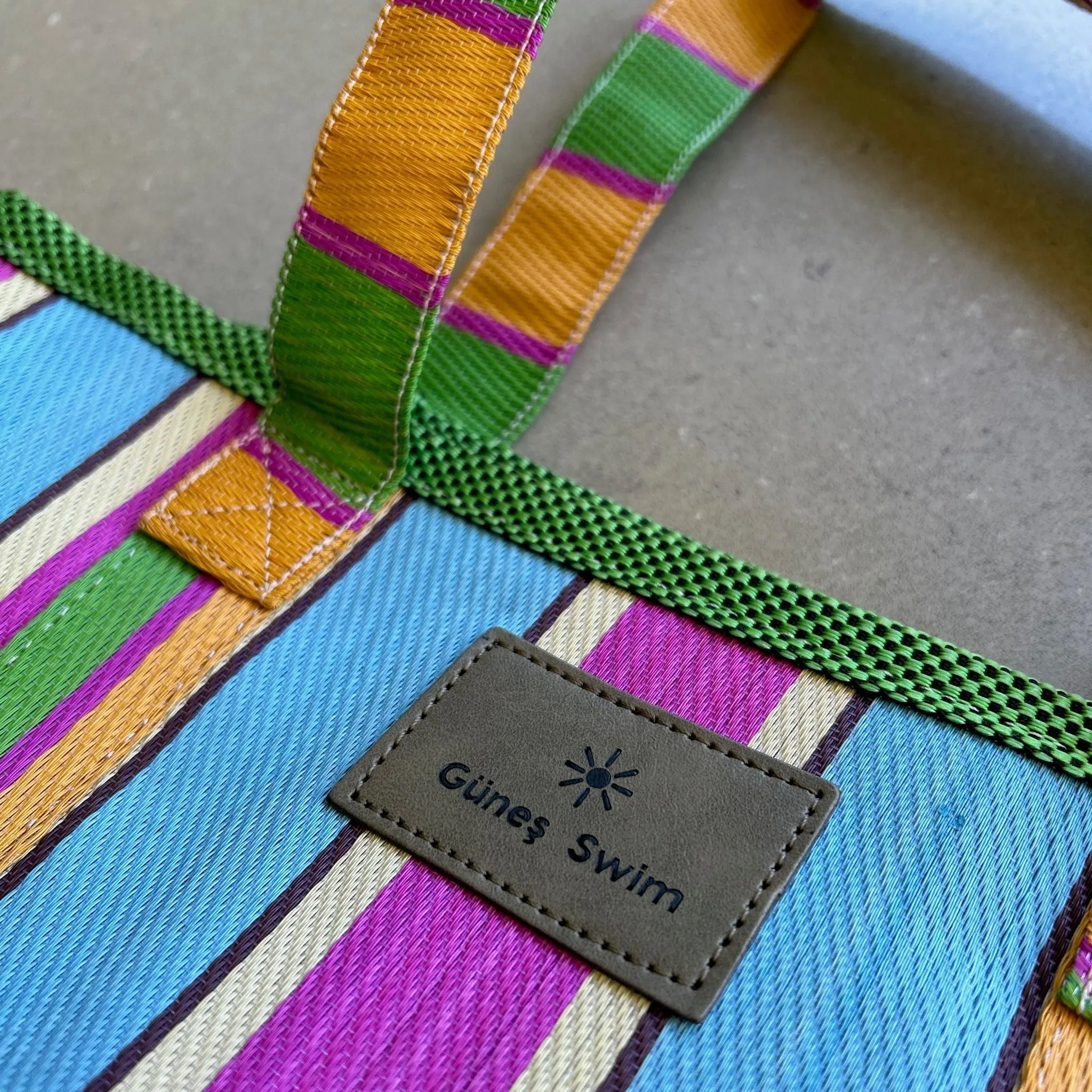 Gunes Tucker Bag