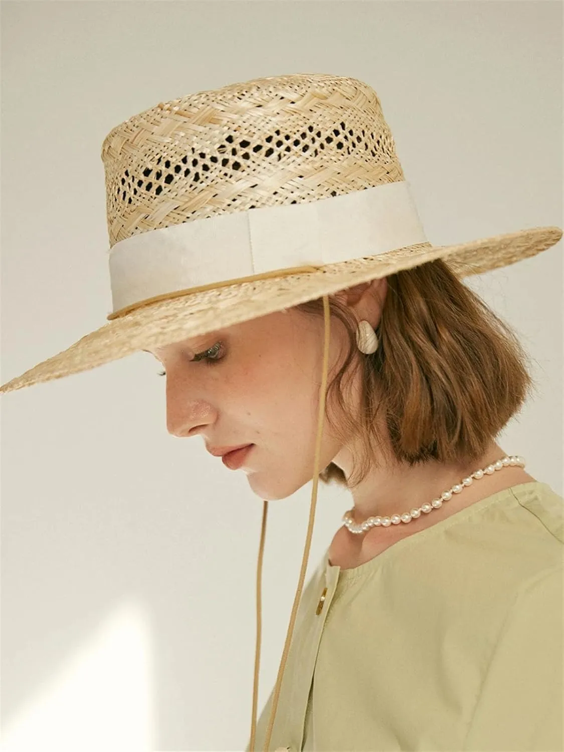 Womens Spring Summer Fashion Sun Protection Sun Hat with Tie Hand Woven Hollow Sisal Flat Top Straw Hat