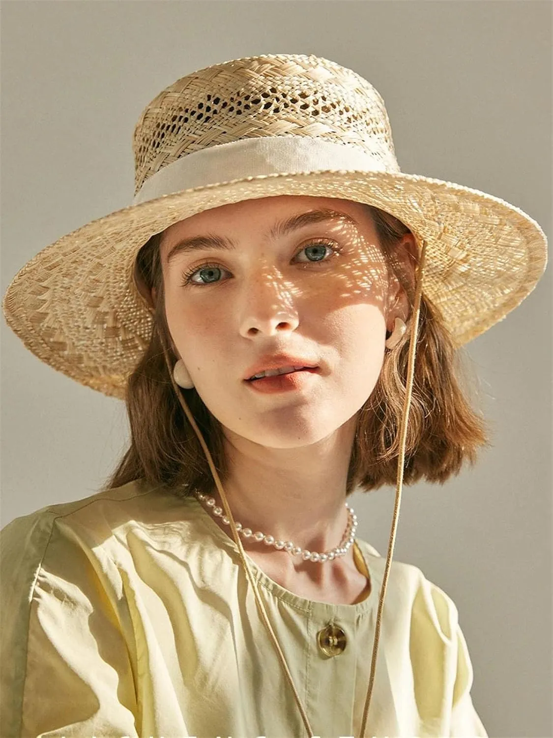 Womens Spring Summer Fashion Sun Protection Sun Hat with Tie Hand Woven Hollow Sisal Flat Top Straw Hat